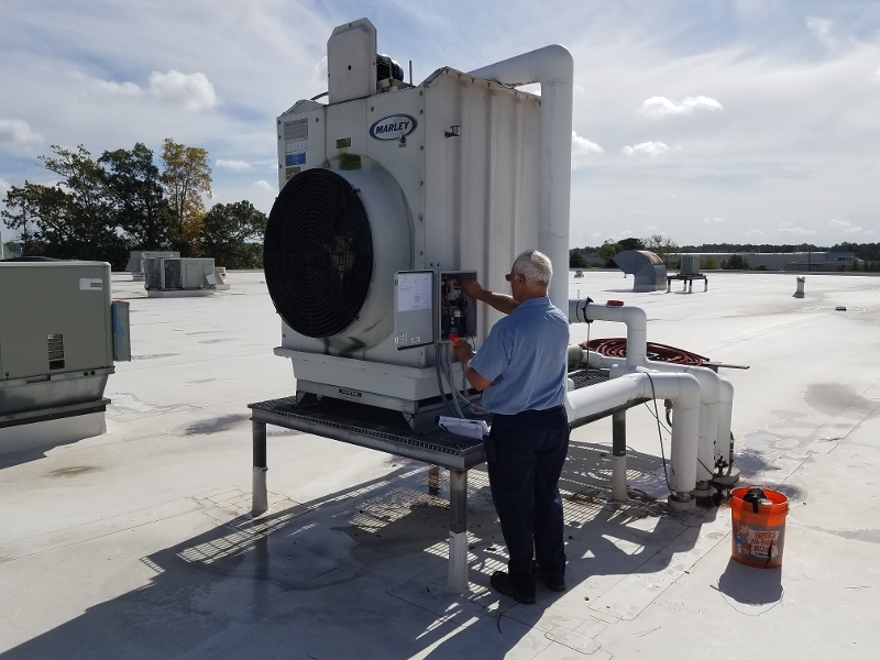 checking the electrical power on cooling tower unit